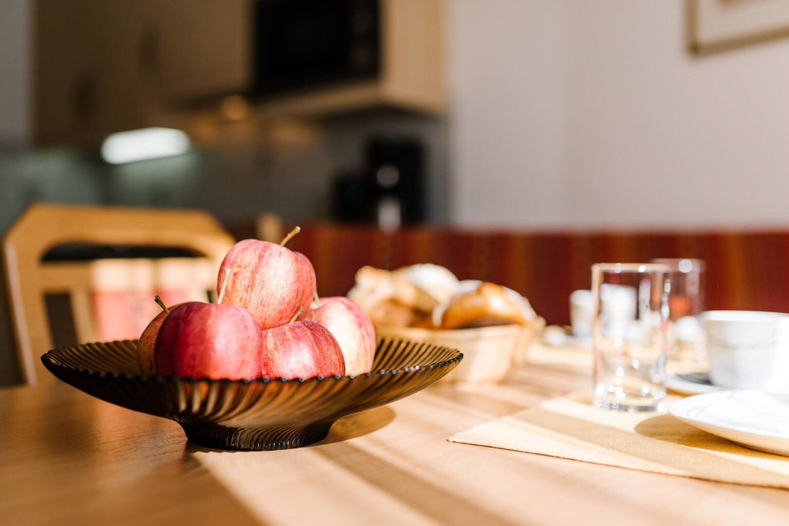 Breakfast table set in the holiday apartment